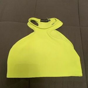 Neon green halter crop top.